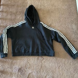 Adidas cropped hoodie. Black w white pinstripe sleeves. Fits Women Size SM / Med